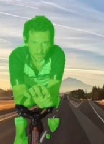 Rider filmed head-on, silhouette highlighted by AeroX